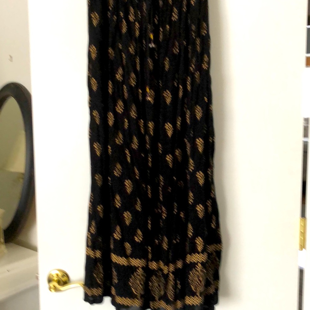 Full length black and gold skirt